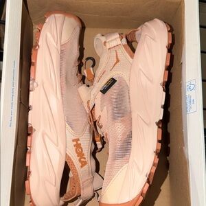 Hoka Women’s Peach and Coral Trail Running Sneakers